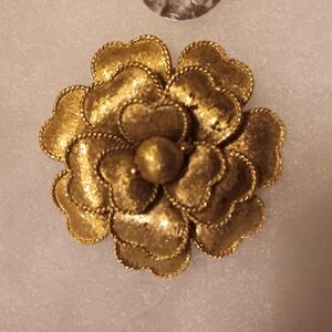 Vintage-Inspired Gold Flower Brooch with Textured Petals